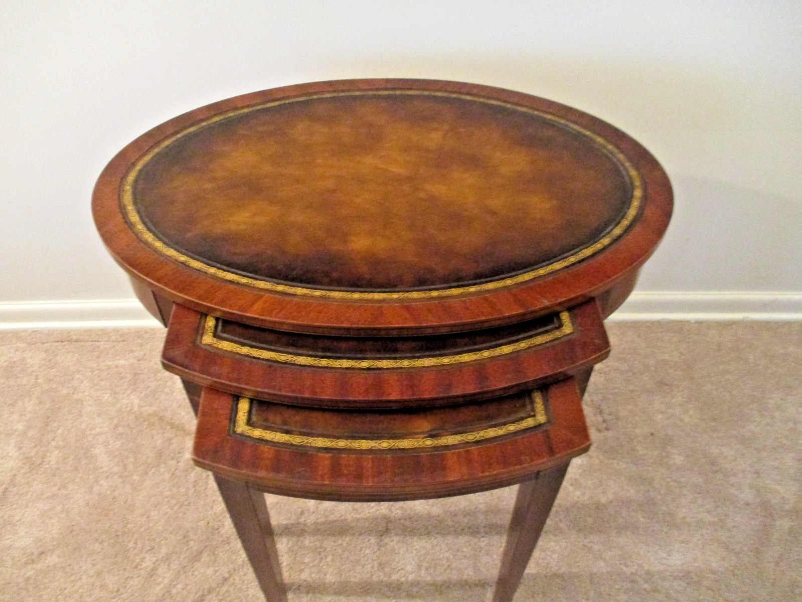 mahogany nesting tables leather top oval set of 3 ship $75.00