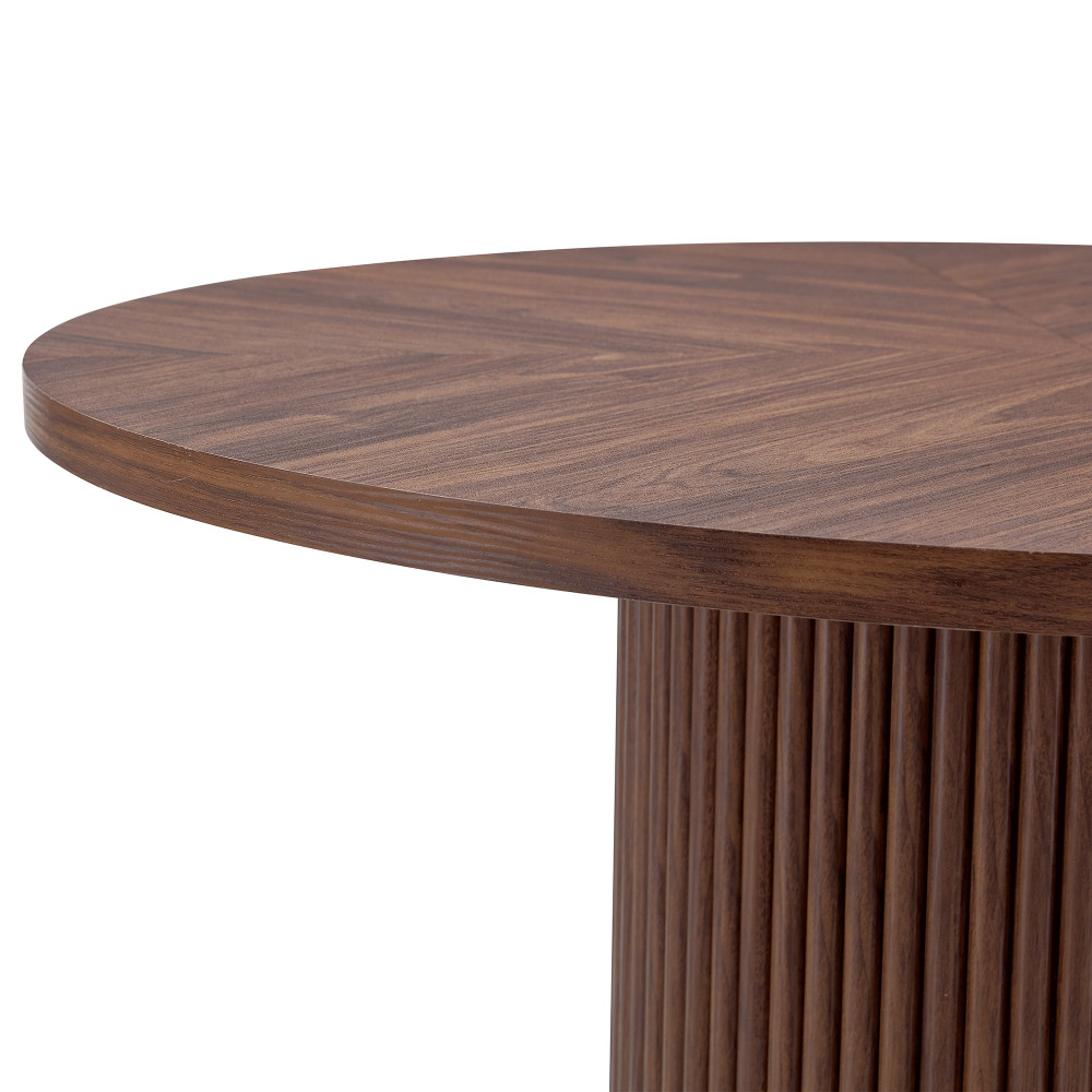 A modern spliced circular dining table with a diameter of 42 inches