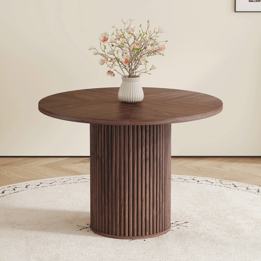 A modern spliced circular dining table with a diameter of 42 inches