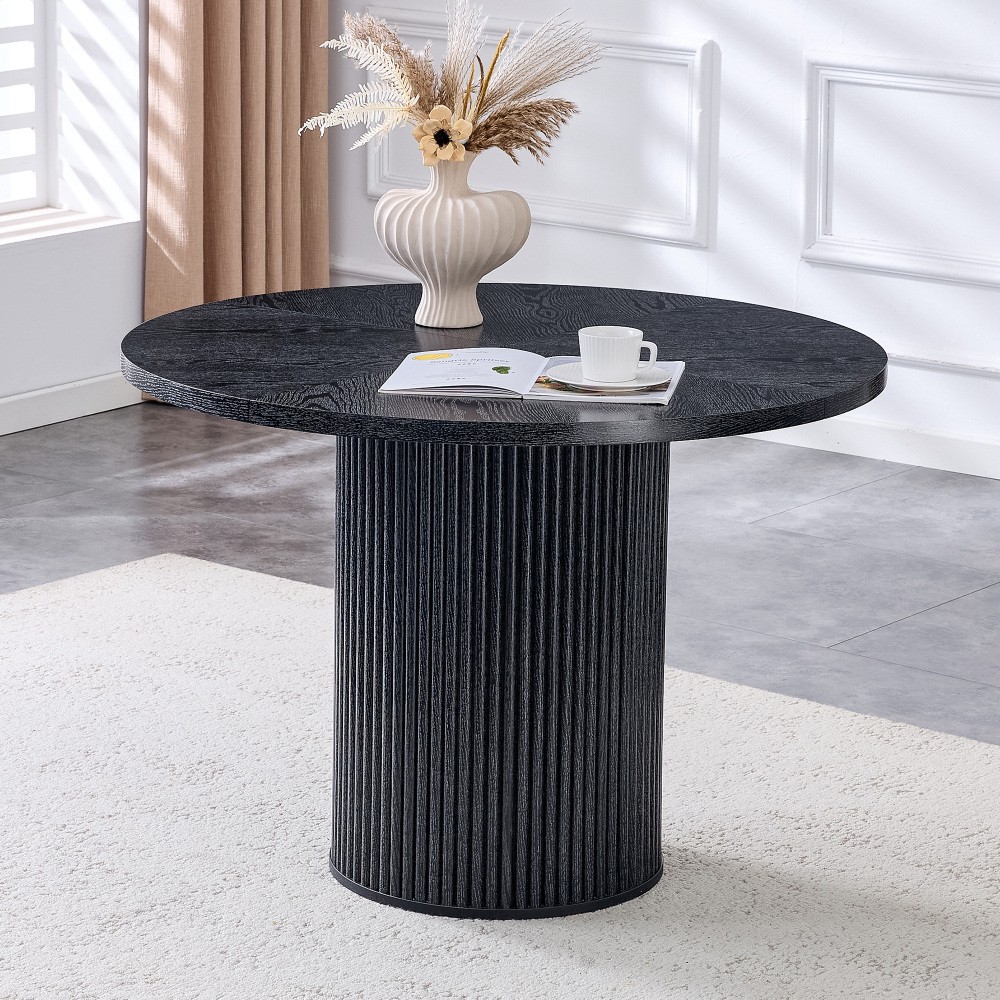A modern spliced circular dining table with a diameter of 42 inches
