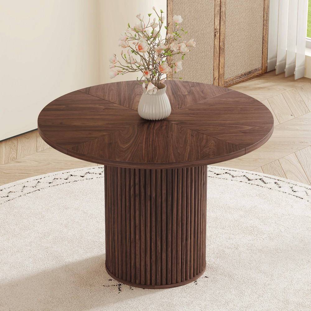 A modern spliced circular dining table with a diameter of 42 inches